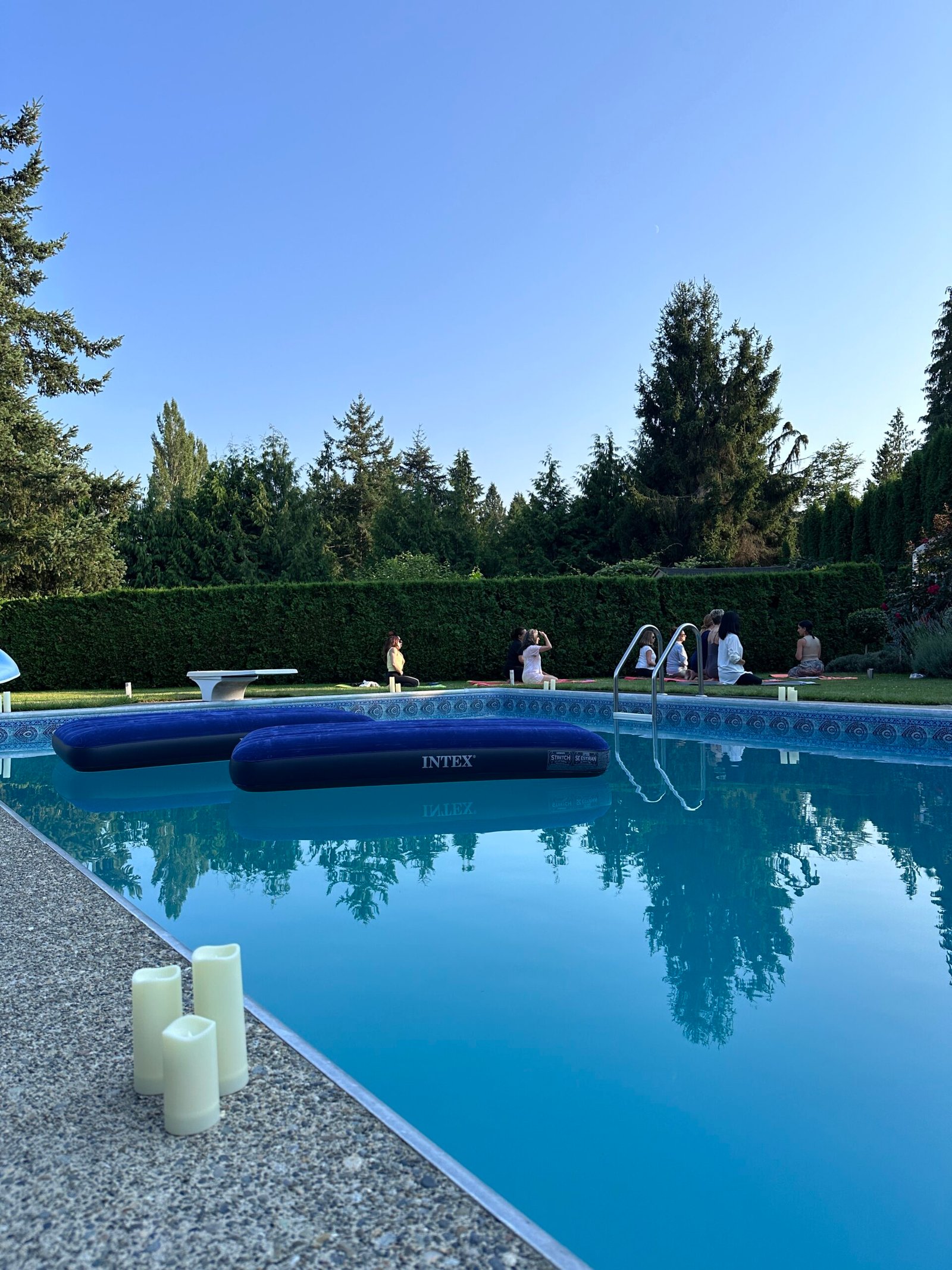 People floating on water during a sound bath