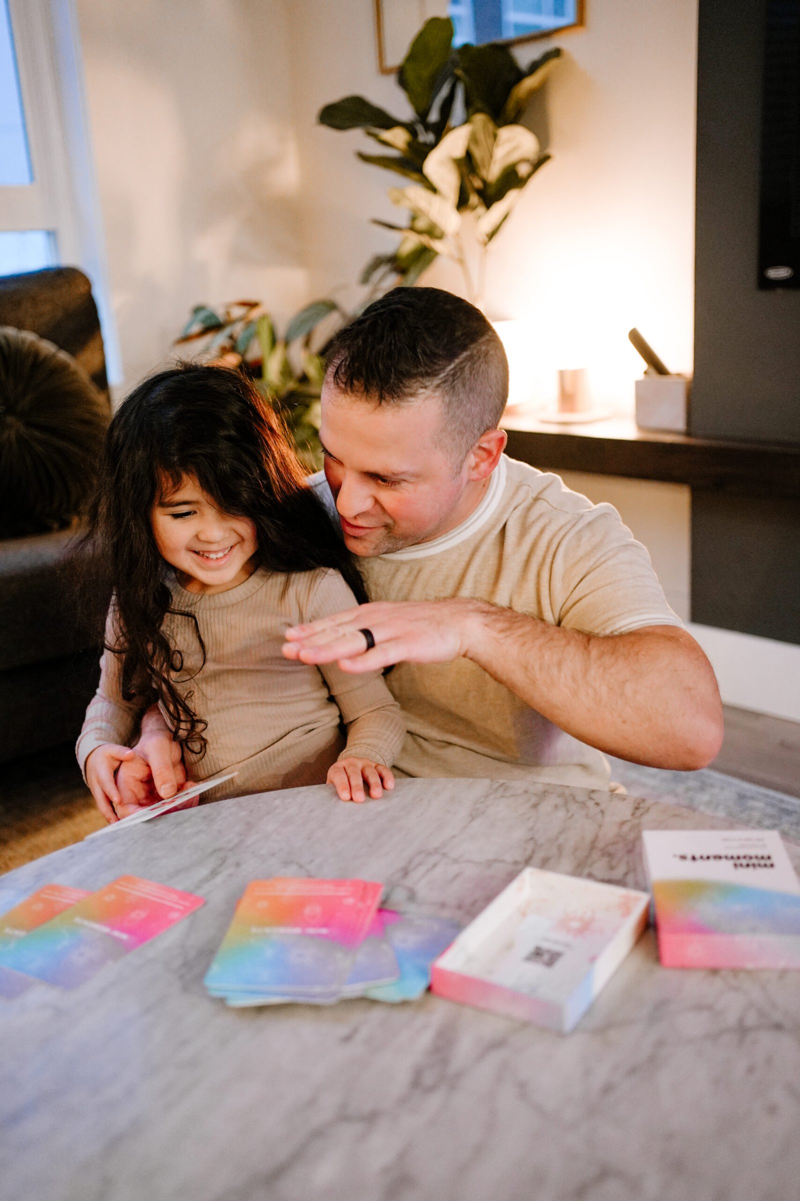 Holding a Mini Moments affirmation card